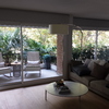 Puerta balconera corredera de aluminio blanco con paño fijo