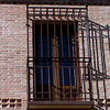 Limpieza de cristales de un balcón cerrado en una vivienda particular