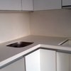 Cambiar granito bancada cocina, reparar o cambiar muebles de cocina y pago factura fontanero por escape de gas