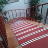 Enmoquetar escalera y pasillo