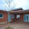 Realización de muro exterior, separación de casa vecino