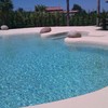 Cambiar la arena a la depuradora de la piscina