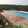 Solado madera alrededor piscina