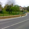 Hacer muro de piedra perimetral de 80 mtrs lineales x 2 mtrs altura