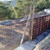 Construir 3 muros en parcela