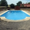 Construir piscina prefabricada poliéster tipo romana.