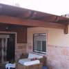 Porche adosado a pared