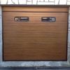 Cerrar puerta de parking y hacer tabique con ventana