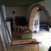 Derribar casa medio derruida