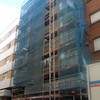 Reforma integral de fachada, arreglos cantos de forjado, sustitución de barandillas y aplicación de mortero acrílico