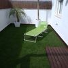 Colocacion de hormigon impreso en terraza con solado y cesped