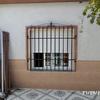 Purta trasera patio con reja