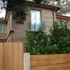 Ampliación de vivienda con cerramiento de aluminio