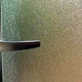 Detalle cristal semitransparente en baño