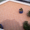 REHABILITACION DE TERRAZA CON MATERIAL IMPERMEABLE TRANSPARENTE Y TRANSITABLE