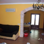 Alisado y pintado de salon con colocación de arco