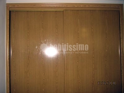 Ampliación buhardilla e instalación de escalera de madera,