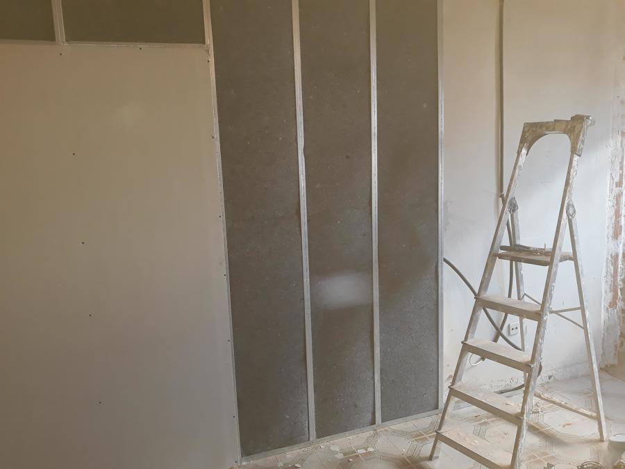 Aislamiento pared vecino