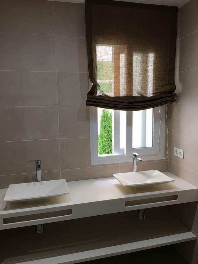 Baño con corian