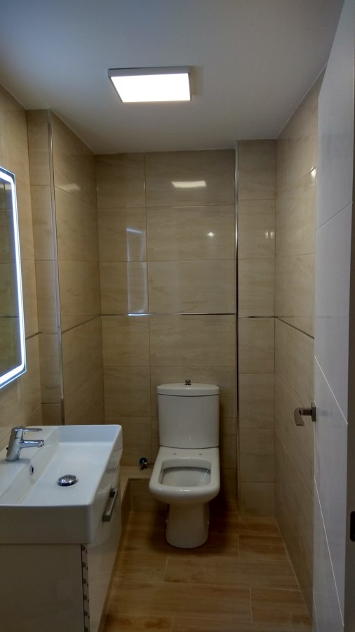 Baño de servicio