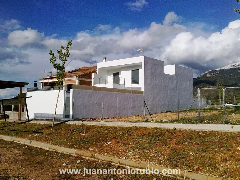 Casa con porches 3