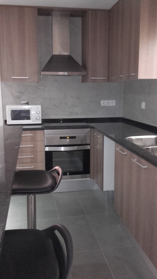 Foto: Cocina con Barra Abierta Al Salón de E-closion, Ambientes De