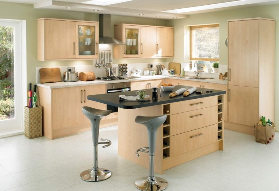 Foto: cocina con isla central y madera de marta #916431 habitissimo Cocina con isla central y comedor