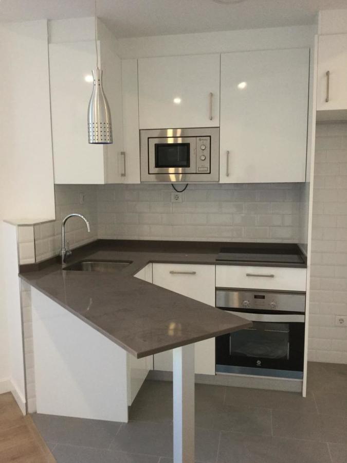 Foto: Cocina con Peninsula de Basika Estudio De Cocinas #510121