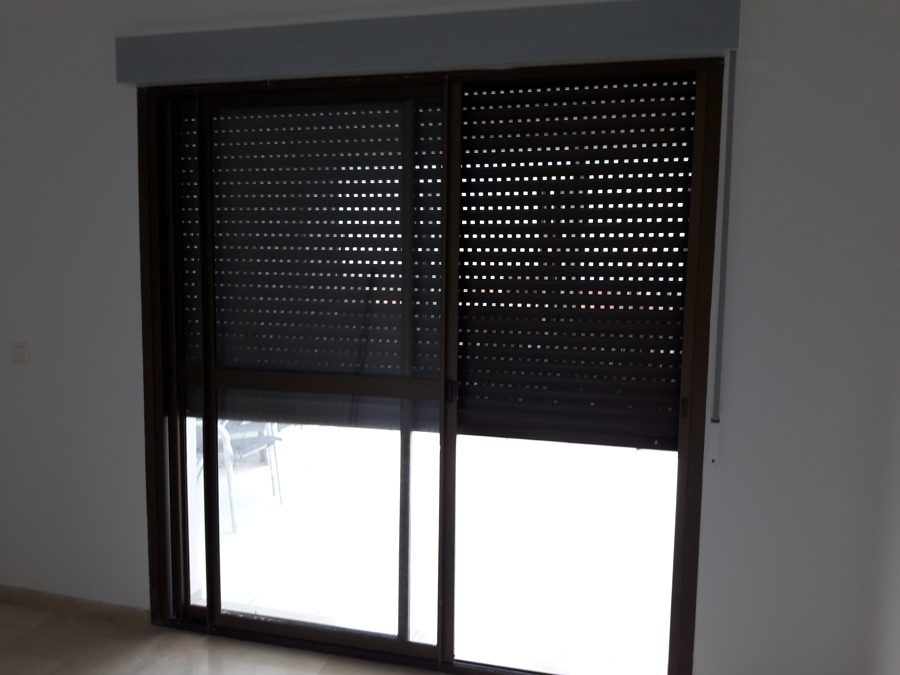 COLOCACIÓN DE PERSIANA DE ALUMINIO