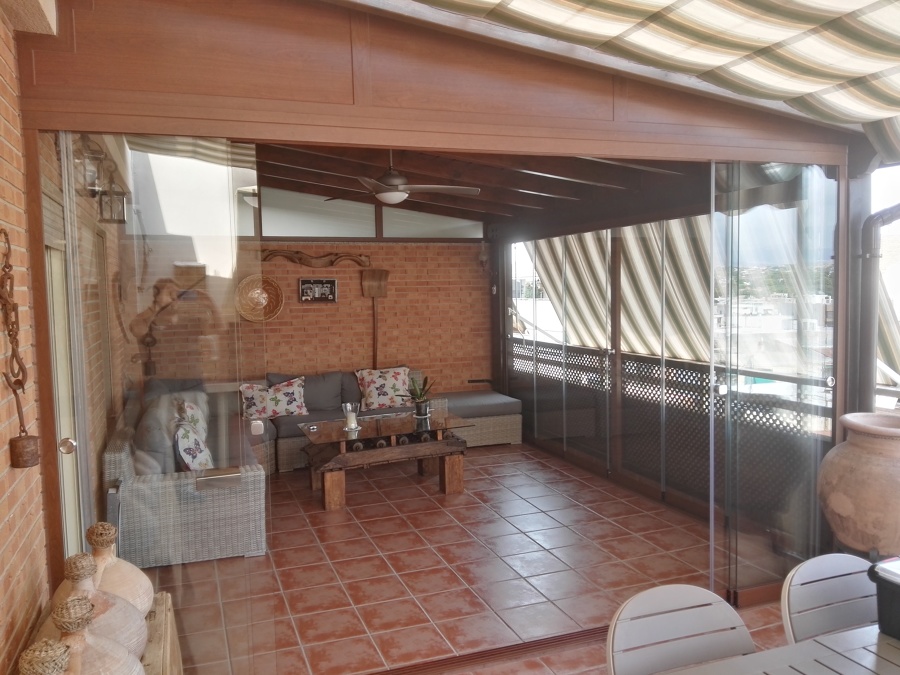 Cortinas de cristal y Pérgola