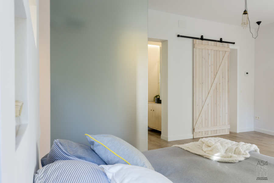 Dormitorio con baño