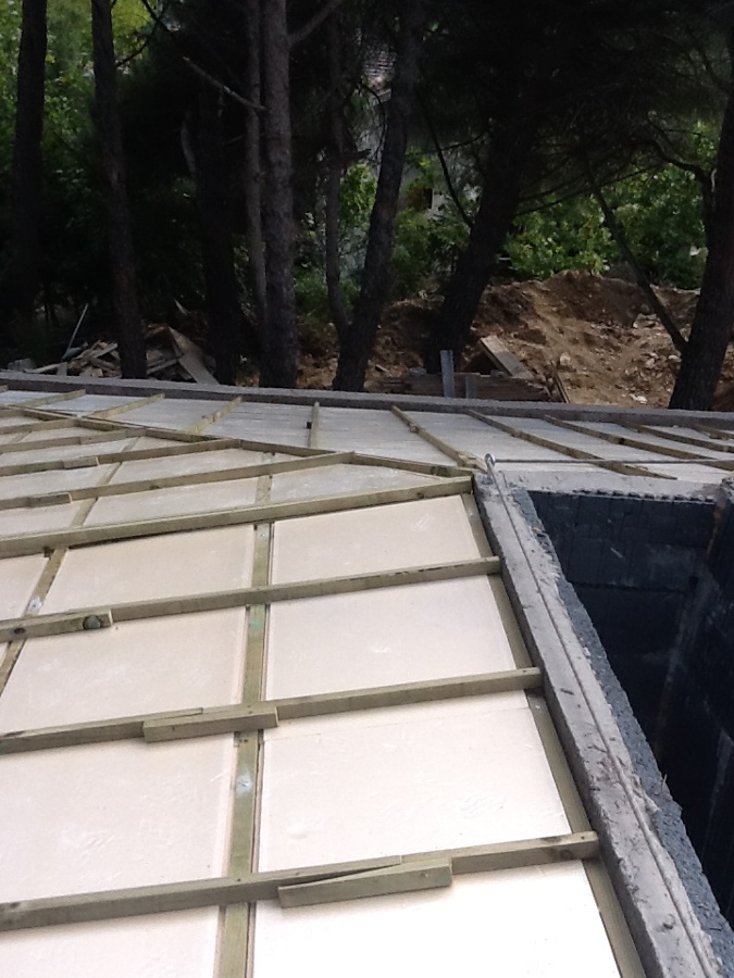 Instalación de rastreles de madera y placas de aislantes