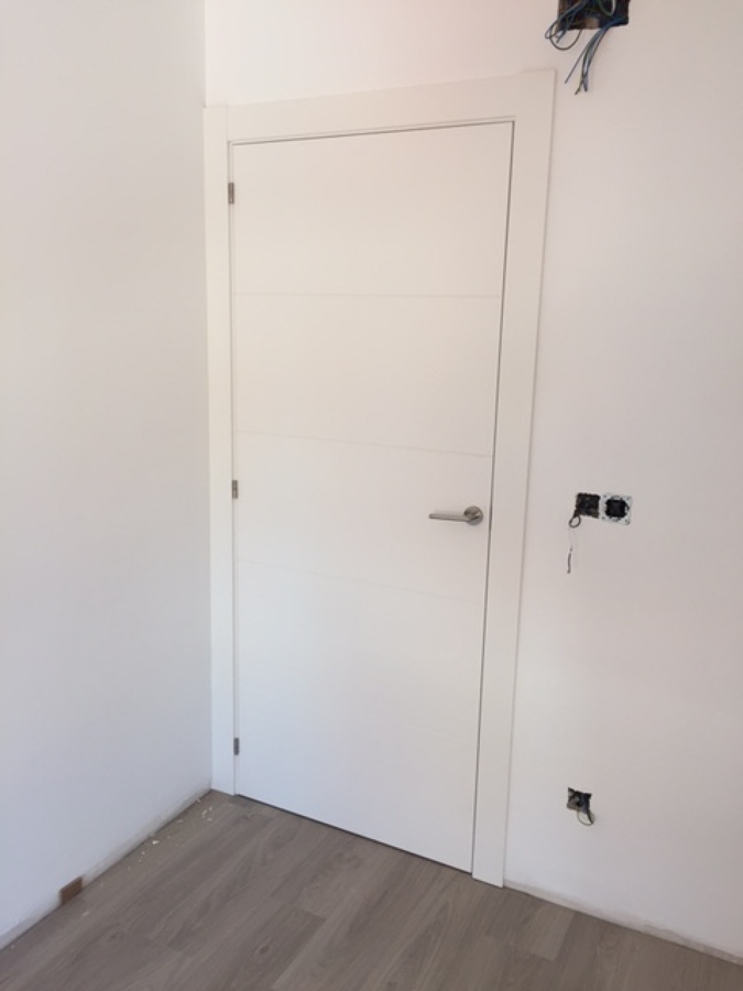 Panelado de puerta de entrada