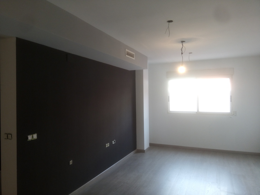 Pared frontal empapelado.