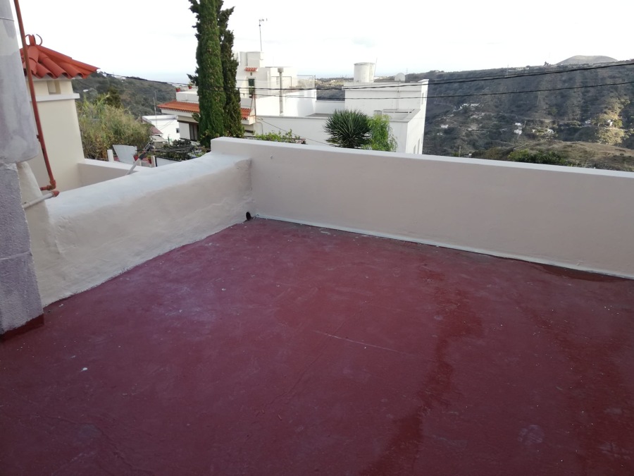 Pintura exterior de vivienda en muros y paredes laterales