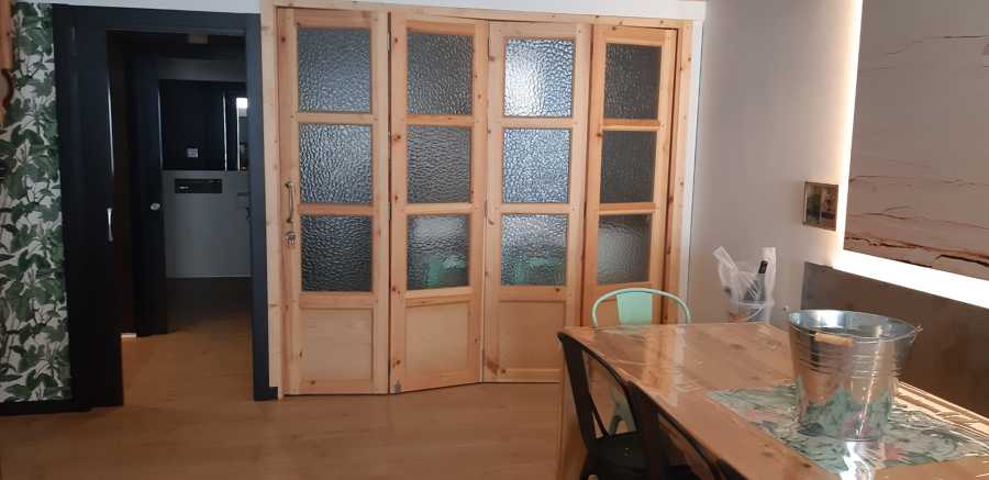 Puerta de vaivén de 4 hojas.