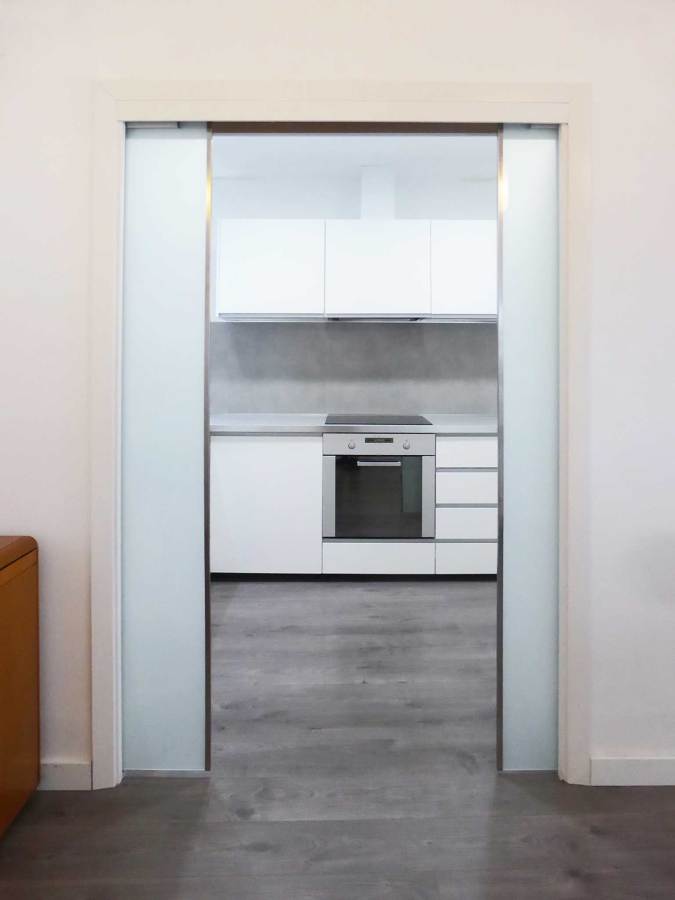 puertas correderas de cocina reforma integral de una vivienda en el centro de barcelona puertas correderas de cocina reforma integral de una vivienda en el centro de barcelona