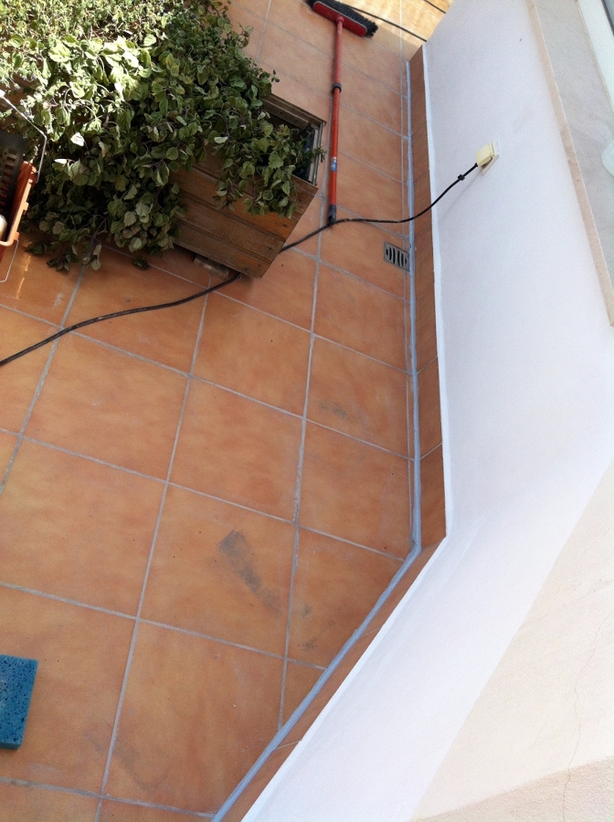 REHABILITACION DE TERRAZA CON MATERIAL IMPERMEABLE TRANSPARENTE Y TRANSITABLE