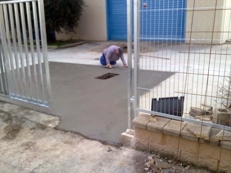 Reparacion de pavimento y valla