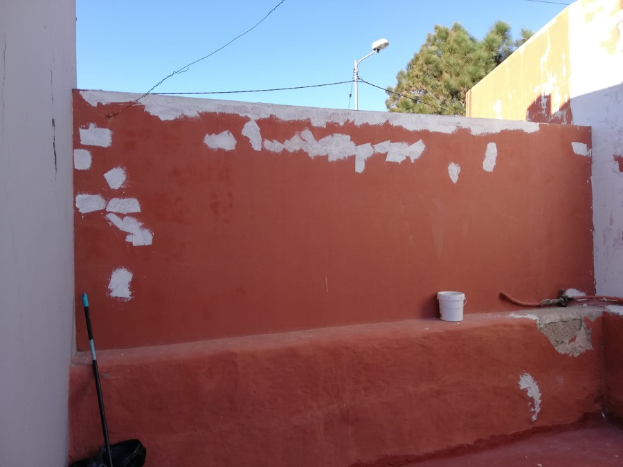 Reparación de superficies en exterior de vivienda muros laterales