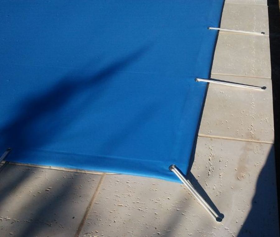 Sujección del cobertor