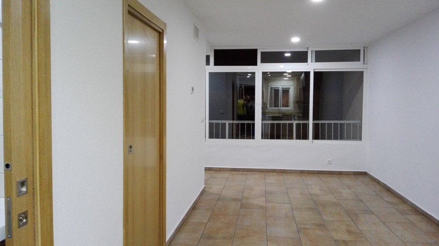 Unificación de salón con balcón