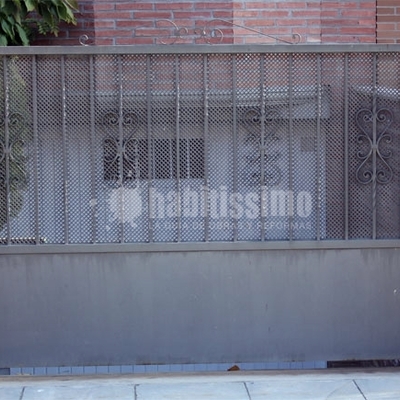 Puertas batientes de hierro