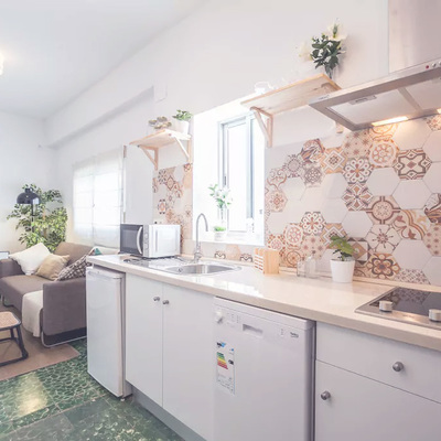 Cocina abierta al comedor y al salón