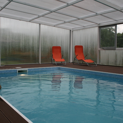 CONSTRUCCIÓN DE PISCINA CUBIERTA