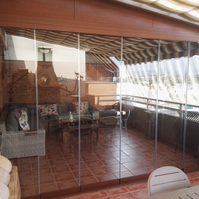 Cortinas de cristal y Pérgola