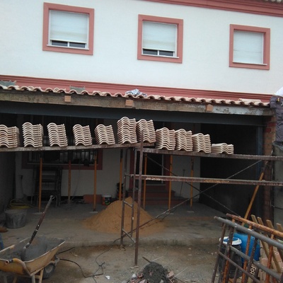 Construcción de medianeras entre vecinos y porche