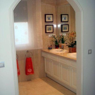 Realización de arco entre acceso vestidor al baño principal