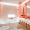 Baño con bañera con porcelánico y terrazo