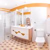 Baño con suelo hidráulico